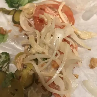 All the onions I picked out of one half of the NASTY Fried Shrimp Po Boy.