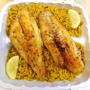 Cajun Grilled Catfish platter with rice.