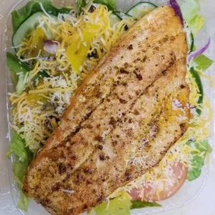 a salad in a plastic container