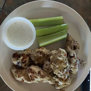 Chicken wings with garlic/parmesan sauce.