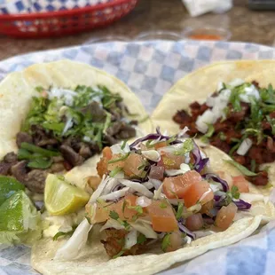 Asada, fish and Al pastor tacos