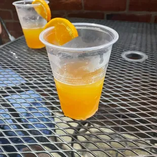 two glasses of orange juice