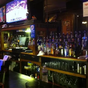 a bar with a lot of bottles