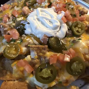 Baked heaven. I mean nachos. Every chip Is the perfect bite.