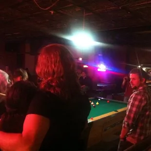 people playing pool