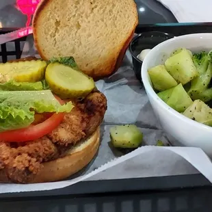Pork tenderloin sandwich and grilled veggies.