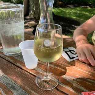 Out back at a table.