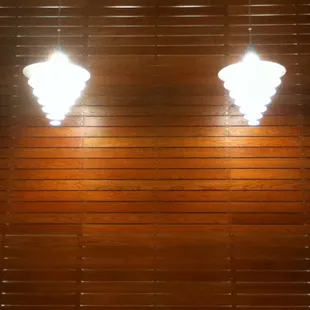 Not very photogenic, but beautiful glass discs independently suspended by wire.