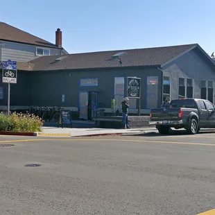 a car parked in front of the store