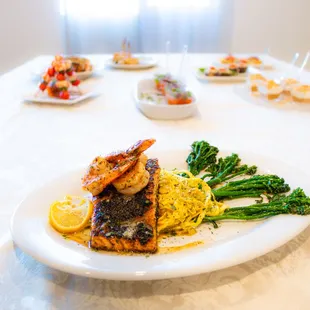 Grilled Marinated Salmon over Garlic Zucchini Noodles w/Sautéed Broccolini Topped w/ Jumbo Garlic Lemon Dill Shrimp