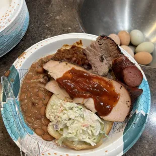 a plate of meat and beans