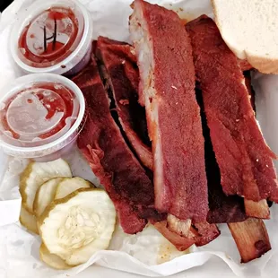 It took 2 boxes for a full rack of ribs. Meat easily falls off the bone. Delicious! Served with pickles, onions and white bread.  Deee-lish!