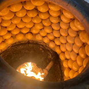 a fire in a clay oven