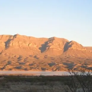 a view of a lake and mountains