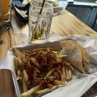 Chicken tacos and garlic fries