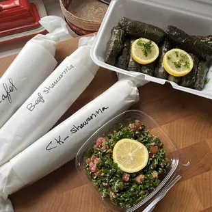 Falafel, beef shawarma and chicken shawarma wraps - meat grape leaves (12) and tabbouleh (1/2)