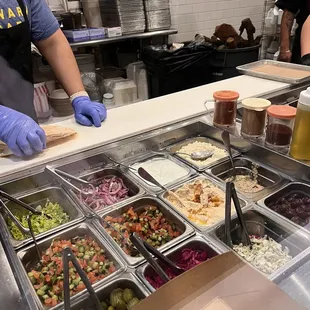 a man preparing food in a restaurant