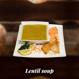 a bowl of soup and bread