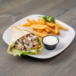 a plate of fries and a salad