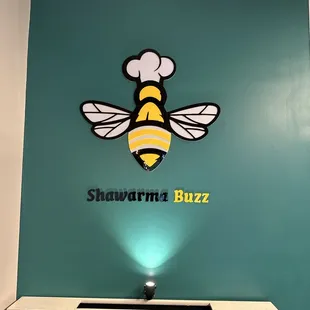 a sign for shawarma buzz