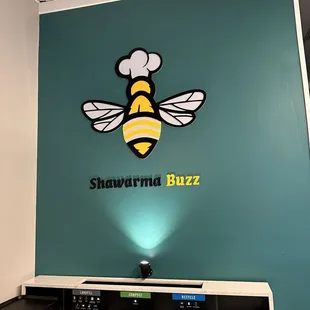 the logo of shawarma buzz