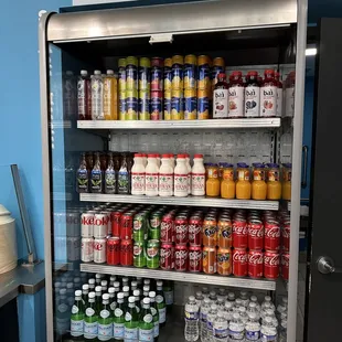a refrigerator full of drinks