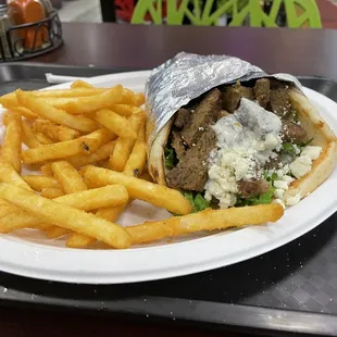 a plate of fries and a sandwich