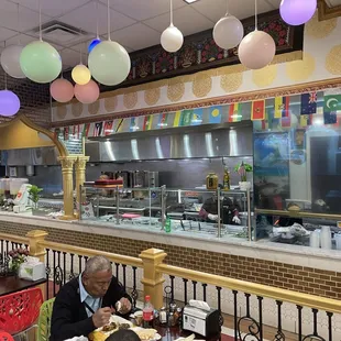 a man eating at a restaurant