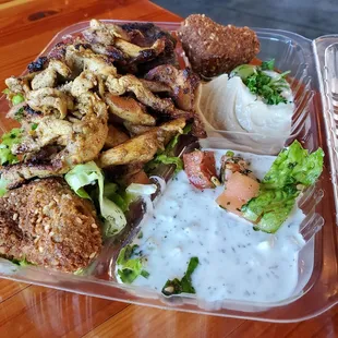 Beef kebab, chicken shawarma, salad, hummus