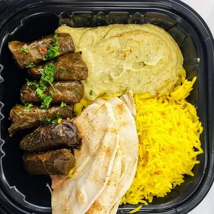 Trio of Sides: Dolma, Yellow Basmati Rice, and Jalapeño Hummus