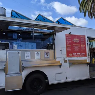 a food truck parked in a parking lot