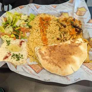 &quot;All in Chicken&quot; Shawarma plate with excellent flavored rice, salad, baba ganoush (can also choose hummus), and pita.