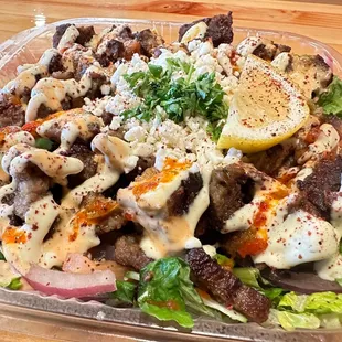 a salad in a plastic container