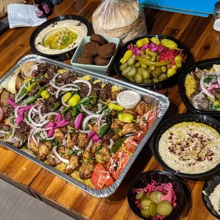 a table full of various foods