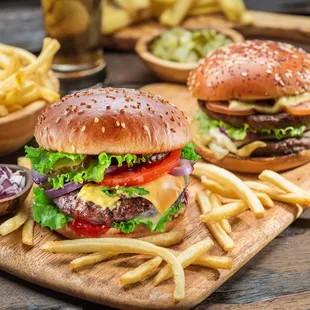 two burgers and french fries