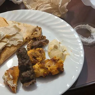 Shish kafta,  Shish tawook, hummus and pita