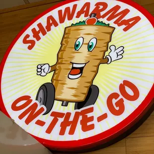 a sign for shawarma on the go