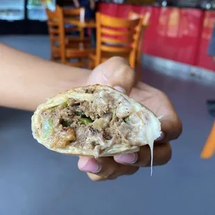 a person holding a wrap