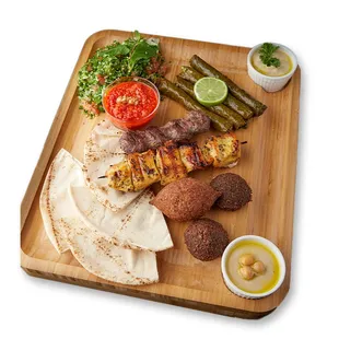 a variety of meats on a cutting board