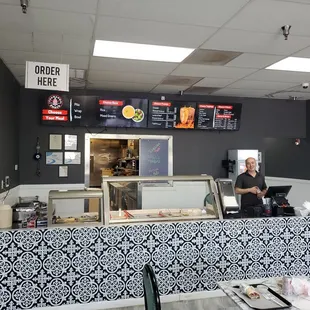 Service counter and the restaurant owner.