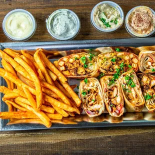 Best Seller Item: Mix Box: Cut-to-Bite size Panini wrap - served with fries and your choice of two of Shawarma Stop sauces.