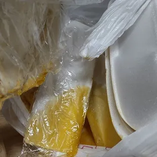 a pile of food wrapped in plastic