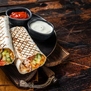 Chicken Shawarma Wrap
 (Chicken, cabbage, pickles, cucumber, tomato, korean carrot, house sauce)