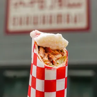 Classic chicken shawarma wrap with a scoop of our signature Toum