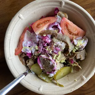 Build your own bowl. I forgot to take a picture and already had a few bites  The gyro was amazing and the garlic sauce was soooo good.