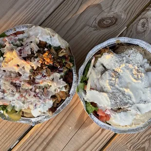 two bowls of food on a wooden table