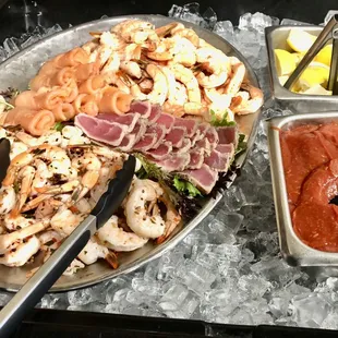 Sunday buffet: shrimp cocktail, tuna, salmon.