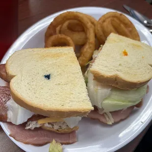 Club sandwich and onion rings