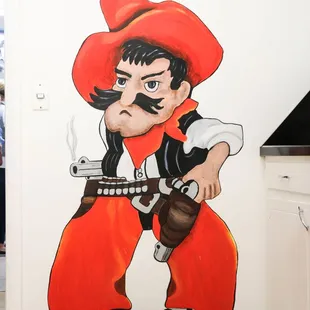 We're Oklahoma State fans, and we have Pistol Pete in-house to prove it!