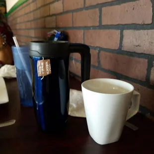a cup of coffee on a table